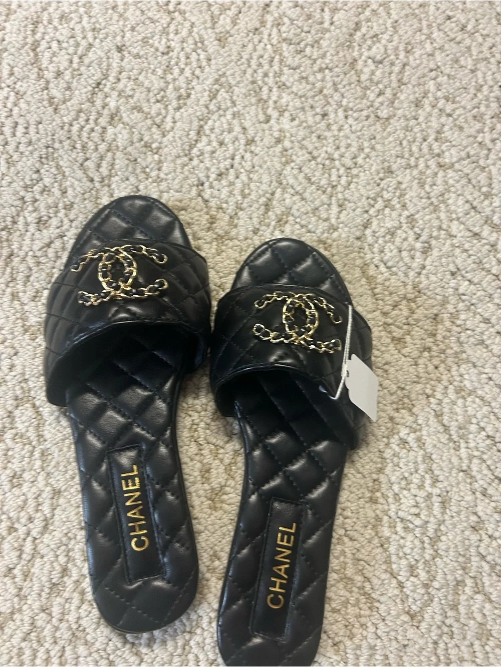 CHANEL Black Quilted Leather Slide Mules with Gold CC Chain